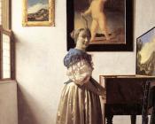 A Lady Standing at a Virginal - 约翰尼斯·维米尔